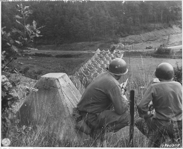 American soldiers look down on the Siegfried Line. Photo Credit