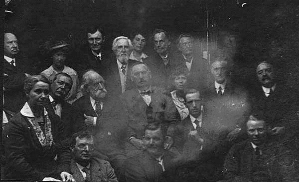 The annual meeting of the "Society for the Study of Supernormal Pictures". Including Sir Arthur Conan Doyle and his wife (Center, Left) (1922)