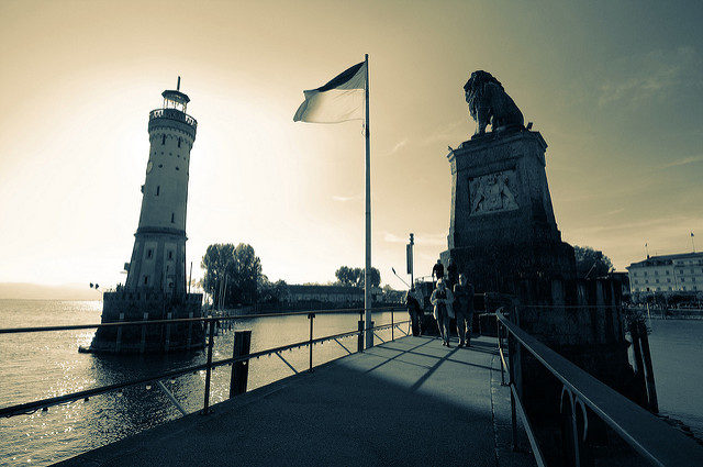 the Lindau lighthouse and lion gurading the entrance to the small boat harbor. Photo Credit