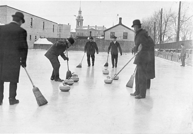 Men curling in Toronto, Ontario, Canada, in 1909. Photo Credit