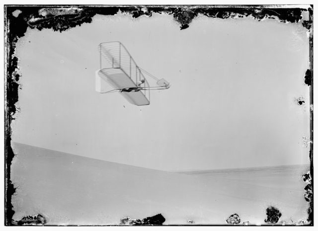 Wilbur gliding to the right, bottom view of glide.1902 Photo Credit 
