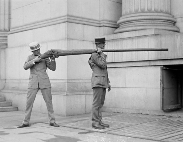 1923 The punt gun’s barrel was so long and heavy that some required help. Photo Credit 