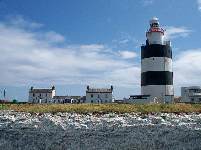 Hook Lighthouse and the houses dating from the same period. Photo Credit