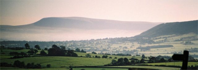 Pendle Hill from the northwest. On the right is the eastern edge of Longridge Fell, which is separated from Pendle Hill by the Ribble valley. Photo credit