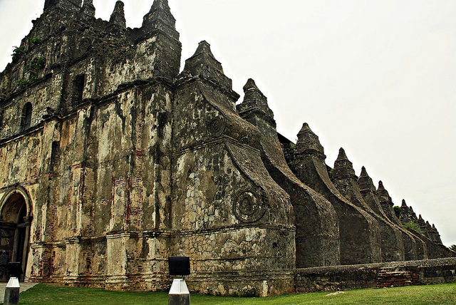 The most striking feature of Paoay Church is the 24 huge buttresses. Photo Credit