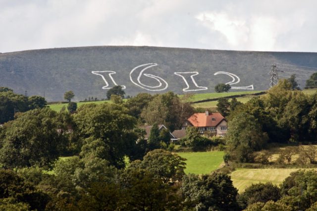 Pendle Hill marked with the date 1612 on the 400th anniversary of the trials. Photo credit