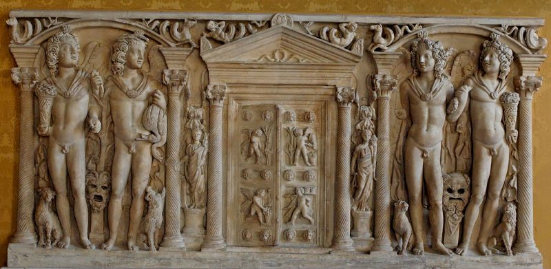 Relief panel from a 3rd-century marble sarcophagus depicting the Four Seasons (Horae) and smaller attendants around a door to the afterlife