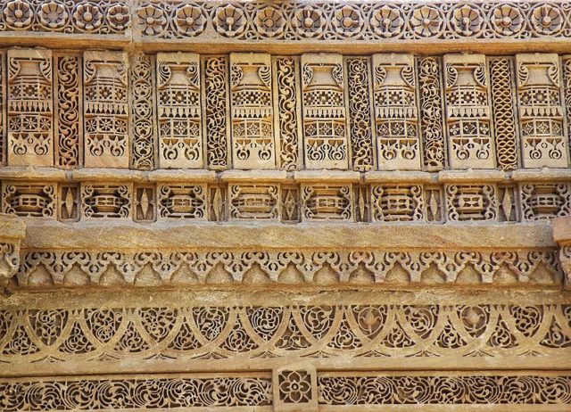 The intricate carving of the well structure. Photo Credit