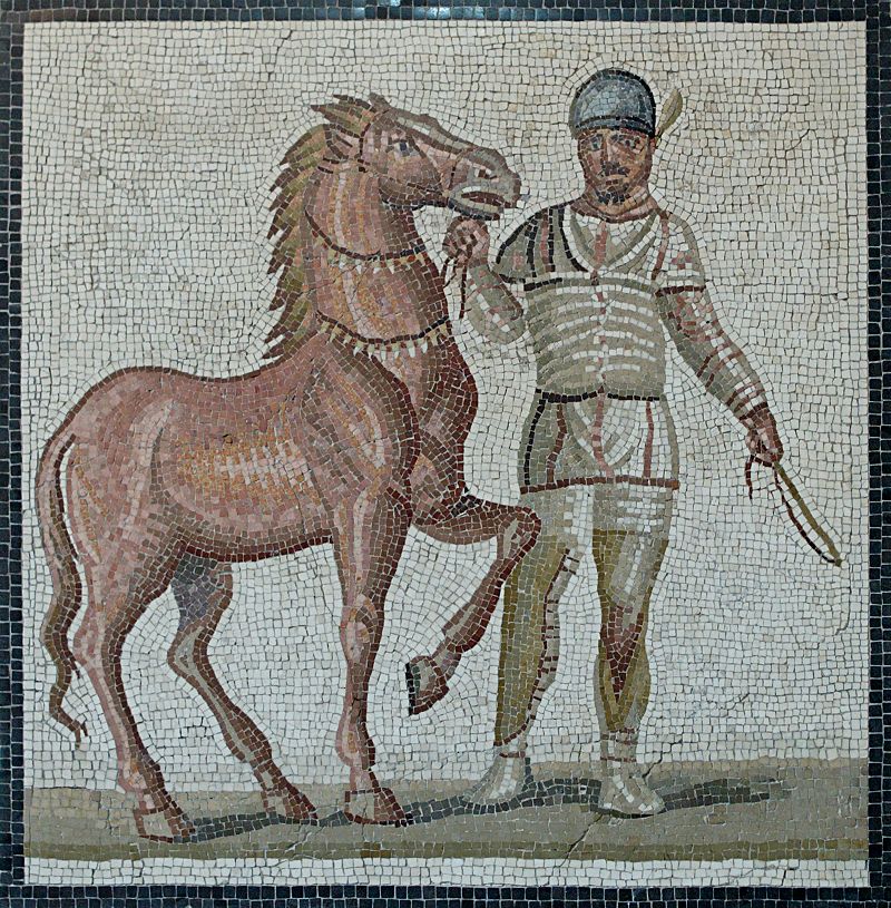 A white charioteer; part of a mosaic of the third century AD, showing four leading charioteers from the different colors, all in their distinctive gear