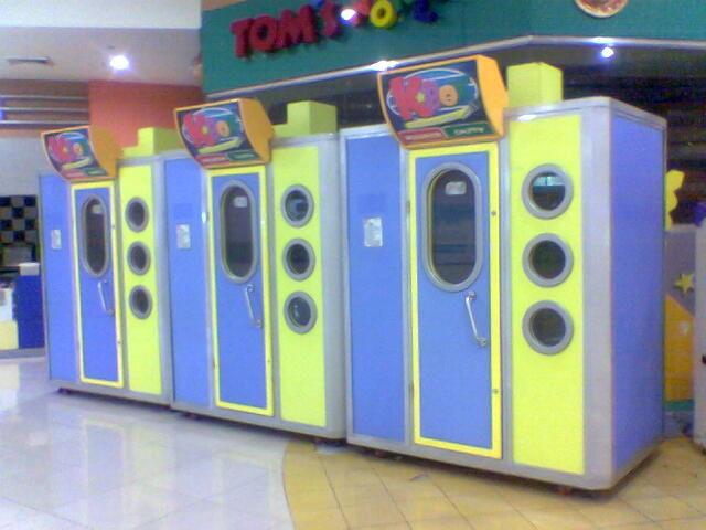 A row of 3 karaoke booths at a shopping center in Angeles City, Philippines. Photo Credit