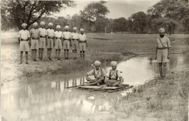 Sikh recruits on a raft made of inverted earthenware pots. Photo Credit: The National Archives UK