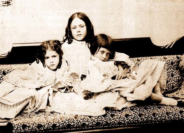 Alice Liddell (right) with sisters c. 1859 (photo by Lewis Carroll)