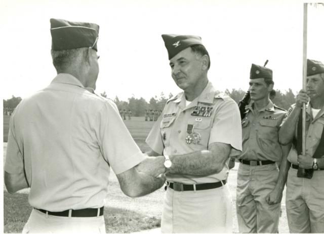 Murray being congratulated at his military retirement ceremony at Fort Jackson on July 30, 1973