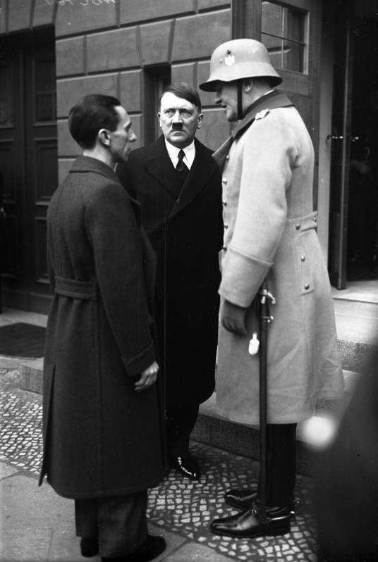 Goebbels, Hitler, and von Blomberg  Photo Credit