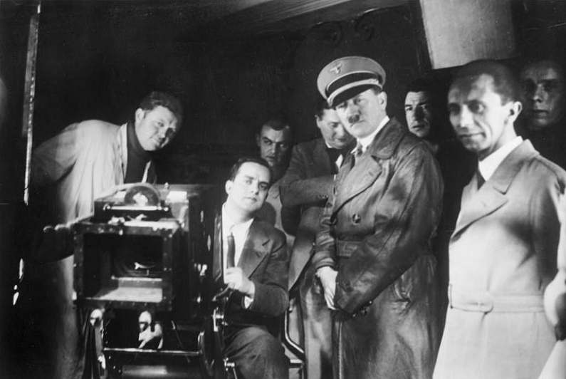 Hitler, Goebbels, and others watch filming at Ufa, 1935. Photo Credit