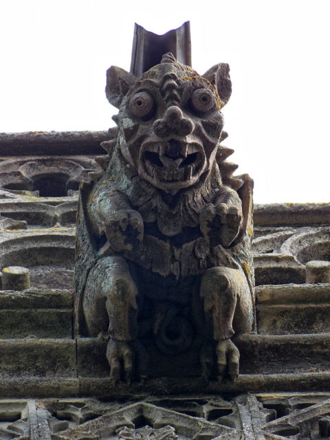 Gargoyle on the tower of Holy Cross Church, Great Ponton, Lincolnshire, England  Photo Credit