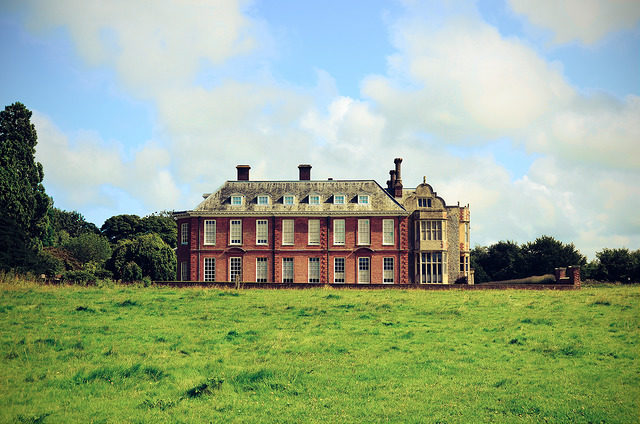 The Hall and 520 acres of woodlands are part of National Trust Photo Credit