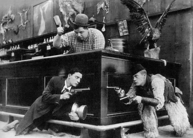 A scene from Out West (1918) with Al St. John (Arbuckle’s nephew) (right), Buster Keaton (left), and Arbuckle.