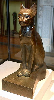 A bronze statue of the cat goddess Bastet Photo Credit