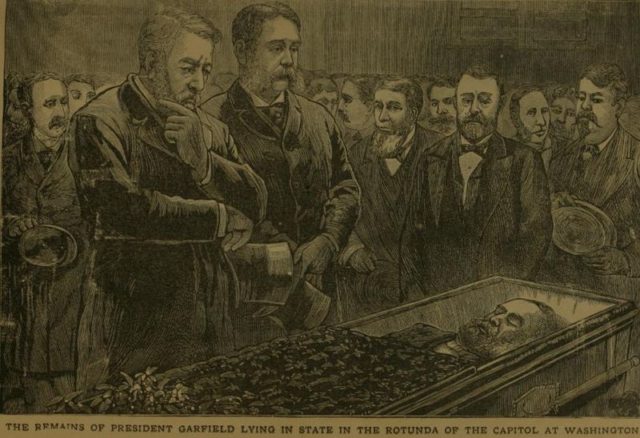 Mourners pass Garfield’s body. Front L–R, Secretary of State James G. Blaine, President Chester A. Arthur, former Vice President Schuyler Colfax, former President Ulysses S. Grant, and 1880 Democratic presidential nominee Winfield Scott Hancock