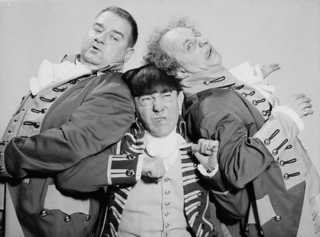 Photo of the comedy team The Three Stooges. From left: Joe DeRita (Curly Joe), Moe Howard (Moe), and Larry Fine (Larry).