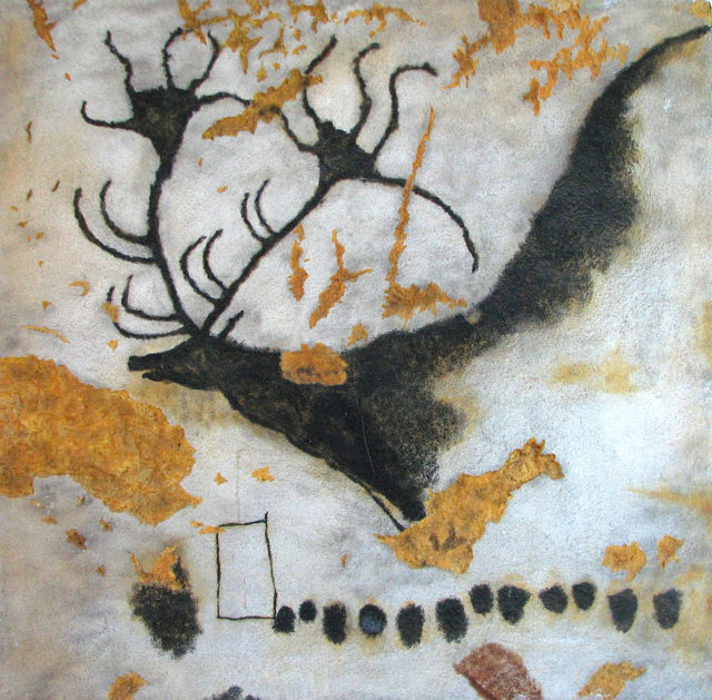 A painting of Megaloceros, an extinct giant deer, with a line of dots in Lascaux