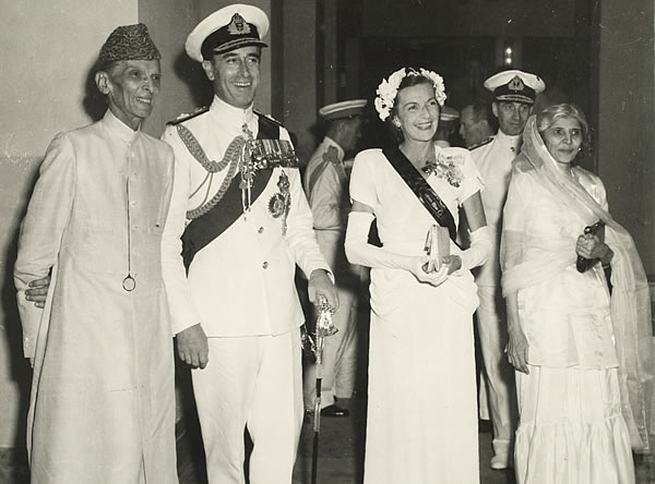 Lord and Lady Mountbatten with Jinnah and his sister, Fatima, 14th August 1947.The end of the empire came in carefully managed ceremonies in Karachi on 14th August at the Legislative Assembly and the subsequent day in Delhi. The Viceroy flew back to Delhi on 14th August: late in the evening the Legislative Assembly passed the resolution proclaiming independence and invited Lord Mountbatten to be the first Governor-General of India. The following day, after being sworn in, the principal ceremony saw the unfurling of the flag of the new dominion of India in Princes Park. Photo credit