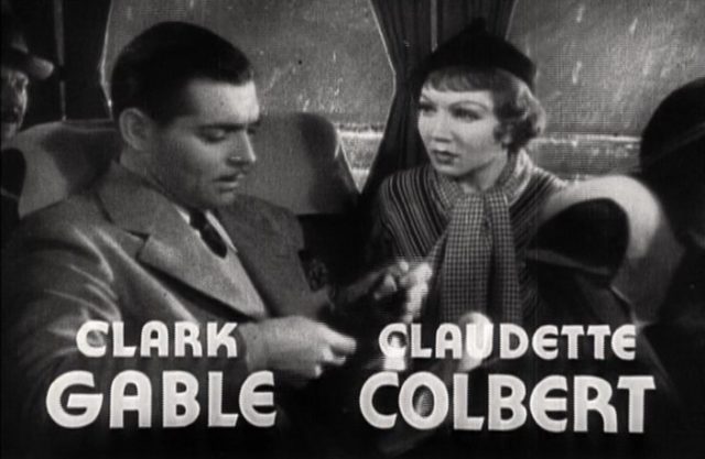 A movie still of Clark Gable and Claudette Colbert from the film It Happened One Night