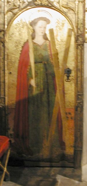 A painting in Barcelona Cathedral of St. Eulalia. She is holding the X-shaped “cross saltire” on which she was crucified