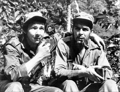 Fidel’s brother Raúl (left) and Che Guevara (right), in their Sierra de Cristal Mountain stronghold south of Havana, Cuba, during the Cuban revolution this June 1958