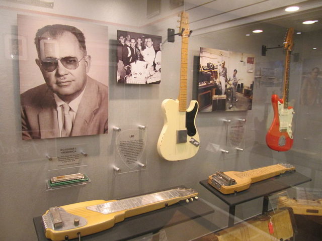 Fender Guitar Factory museum. Leo and early models. Mr. Littlehand CC BY 2.0