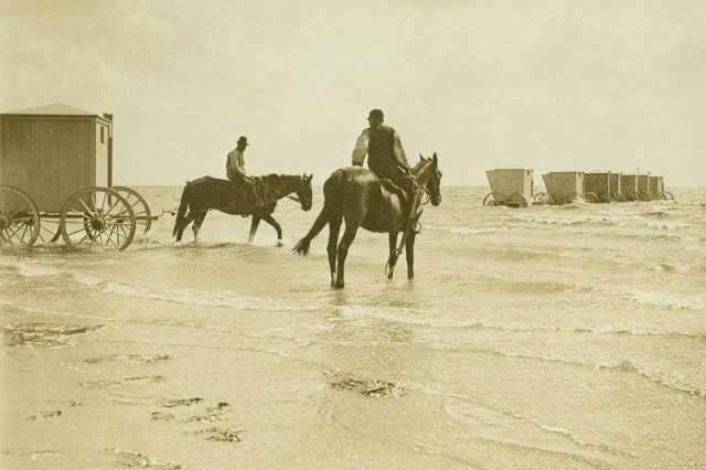 Horseman helping to push and pull the Bathing machines (1895)