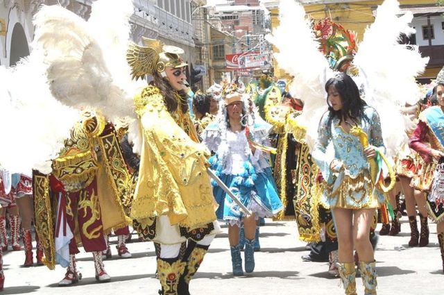 Archangel Michael leading a dance group at the Oruro Carnival. Photo credit