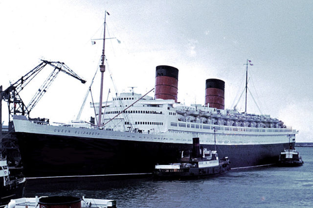 RMS Queen Elizabeth in Cherbourg (Normandy, France) in 1966. Photo Credit