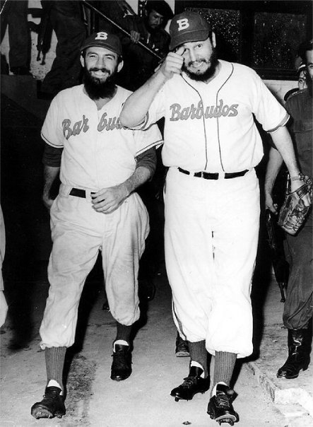 Castro and Camilo Cienfuegos before playing a baseball game
