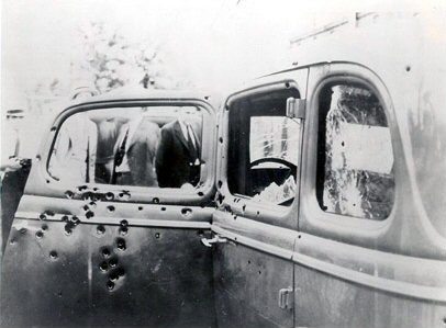 Bonnie and Clyde’s car (1932 Ford V-8), riddled with bullet holes after the ambush.