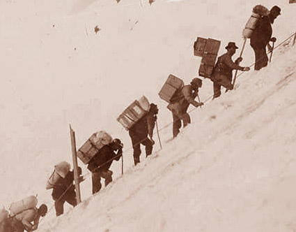 Miners carry gear up the Chilkoot Pass to reach the Klondike c. 1898