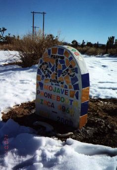 The headstone commemorating the phone booth before its removal. Photo credit