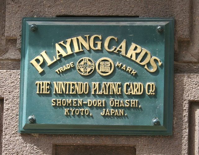 Former headquarters plate, from when Nintendo was solely a playing card company. Photo Credit