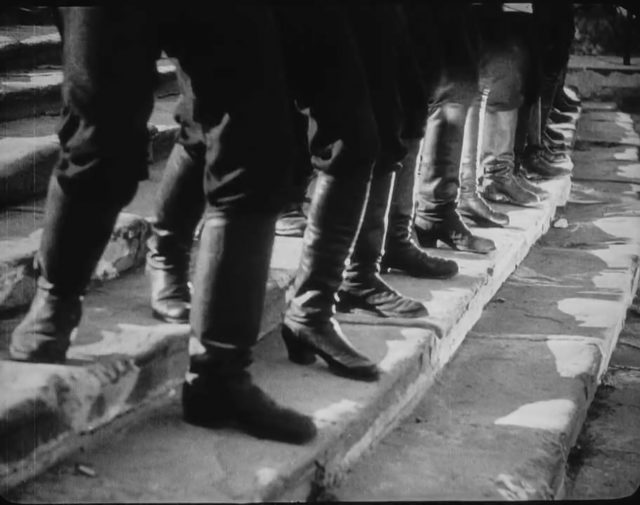 Tsarist boots marching down the “Odessa Steps” from the movie “The Battleship Potemkin”