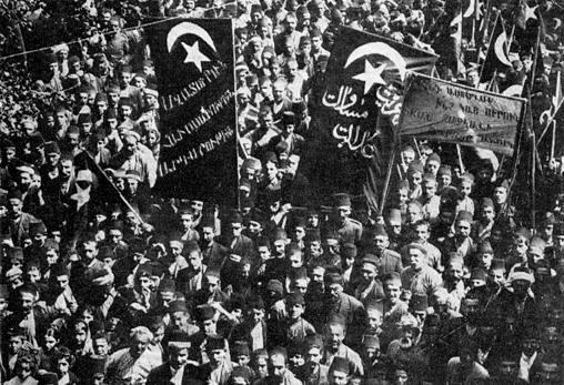 The Armenians of Constantinople celebrate the Ottoman constitution of 1908 and the establishment of a new government. Signs read both in Armenian and Ottoman Turkish languages. Banners in black in both languages read “Liberty, Equality, Justice”