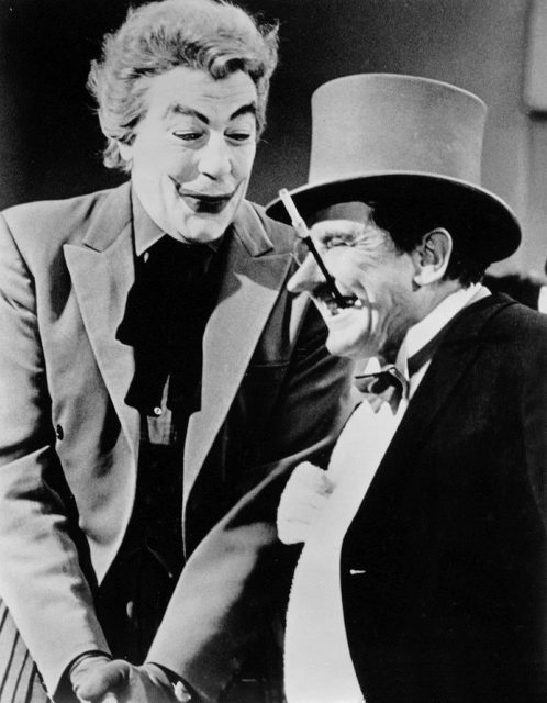 Photo of Cesar Romero as The Joker and Burgess Meredith as The Penguin from the television program Batman.