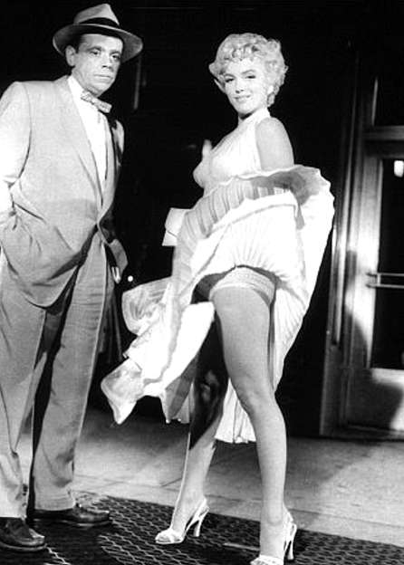 Photo of Tom Ewell and Marilyn Monroe in The Seven Year Itch.