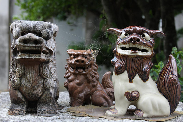 The statues are variations of the fu dogs, the guardian lions of China  Photo Credit