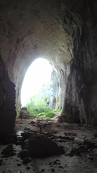 The cave Prohodna – the exit of the cave. Photo Credit