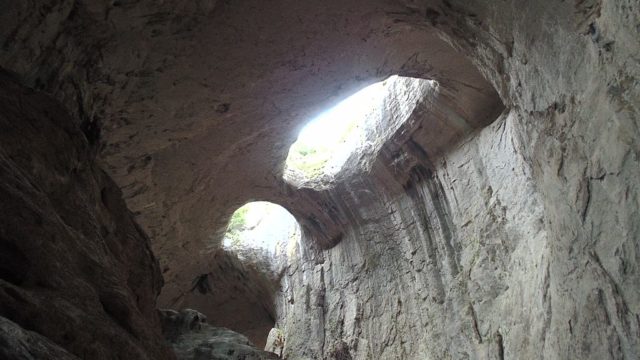 Prohodna Cave, near village Karlukovo, Bulgaria. View from the right towards God’s Eyes (naturally formed holes in the cave’s ceiling with the exact shape of eyes).