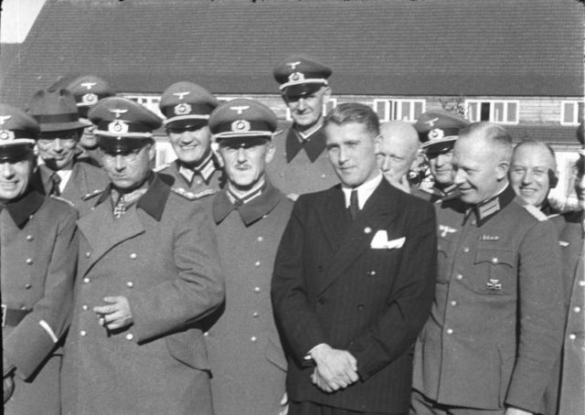 First rank, from left to right, General Dr. Walter Dornberger (partially hidden), General Friedrich Olbricht (with Knight’s Cross), Major Heinz Brandt, and Wernher von Braun (in civil garment) at Peenemünde, in March 1941.