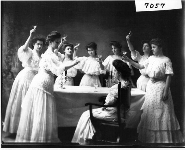 The photo is entitled Toast to the Bride, 1905.