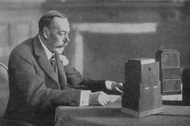 King George V making his annual Christmas Broadcast to the nation as part of the royal tradition in The United Kingdom