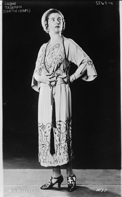 Lilyan Tashman wearing a beaded Canton crepe gown